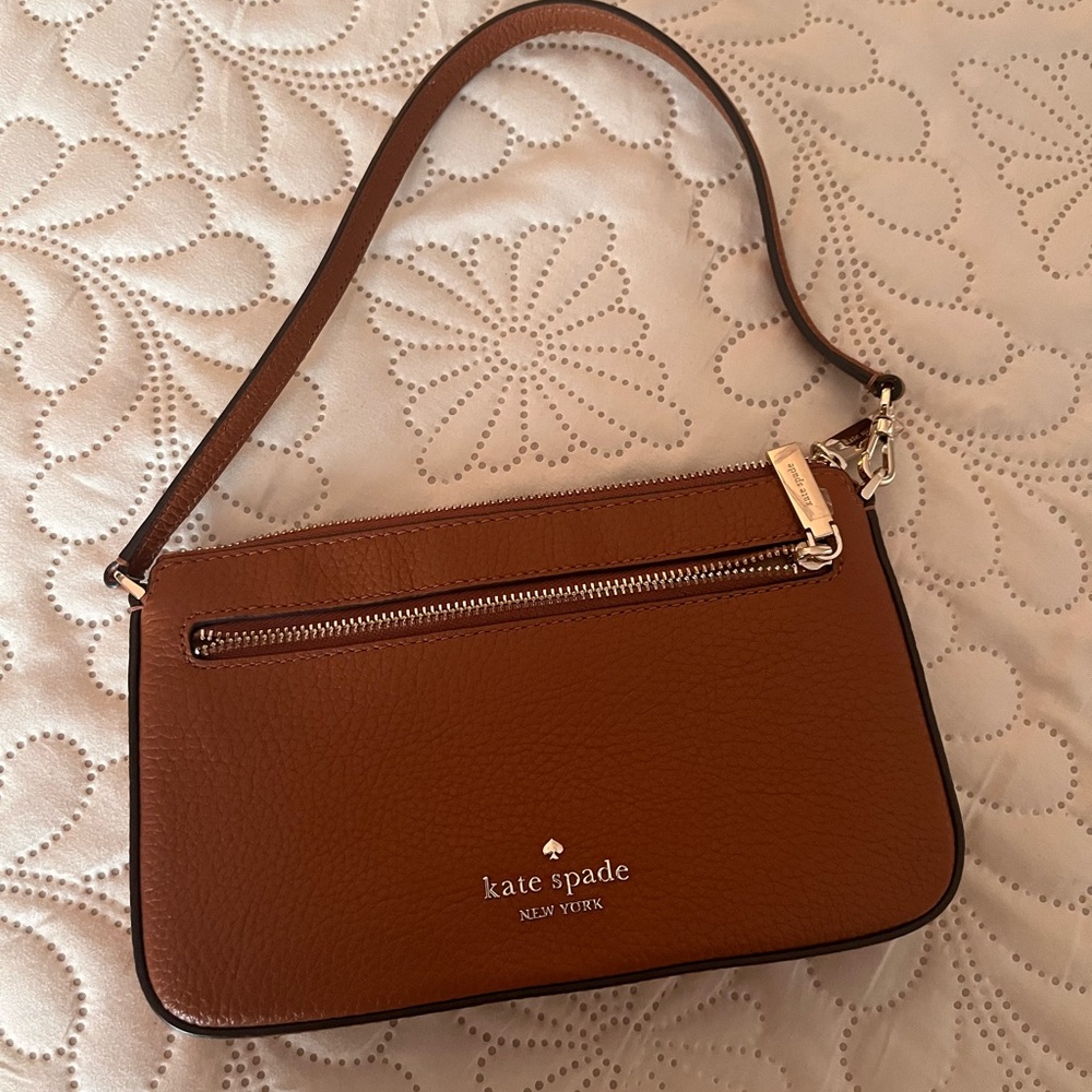 Authentic Kate Spade mini handbag.  Never Used.  Excellent condition